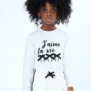 Maglietta Bambina Girocollo – Colore Latte con Fiocchi e Scritta Nera